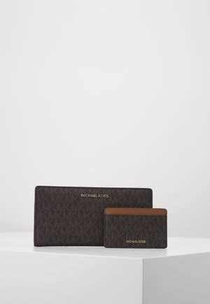 Michael Kors Plånböcker online för dam, herr & barn 